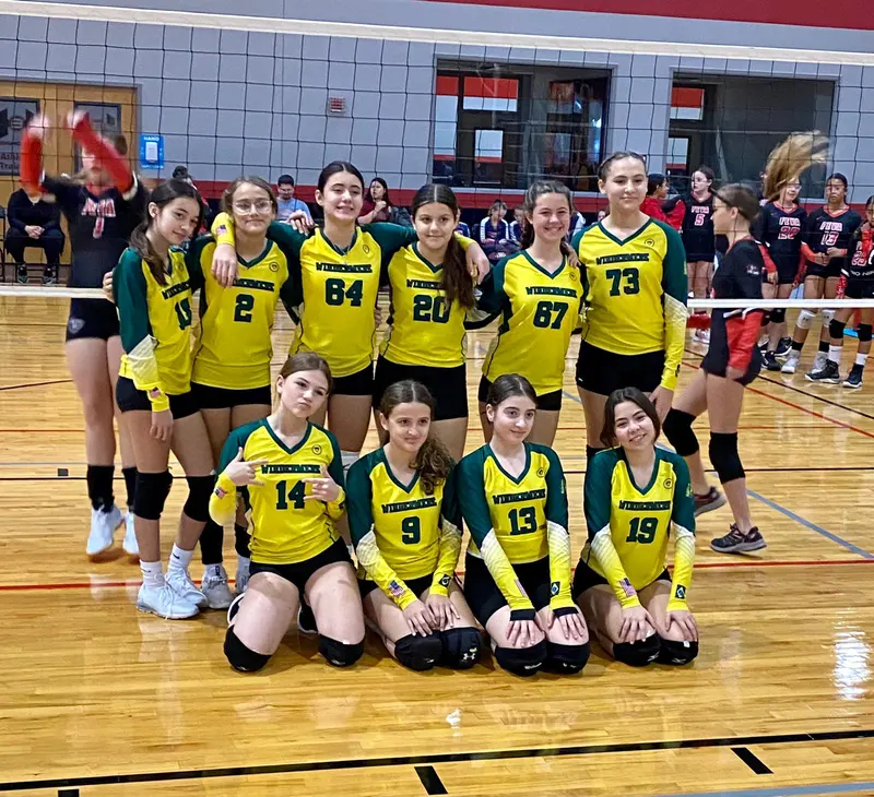 Team in yellow jerseys at a tournament